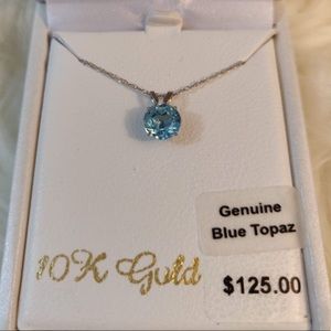 Solid 10k white gold necklace gen. blue topaz